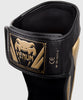 Protège pied-tibia Elite Noir Doré Venum